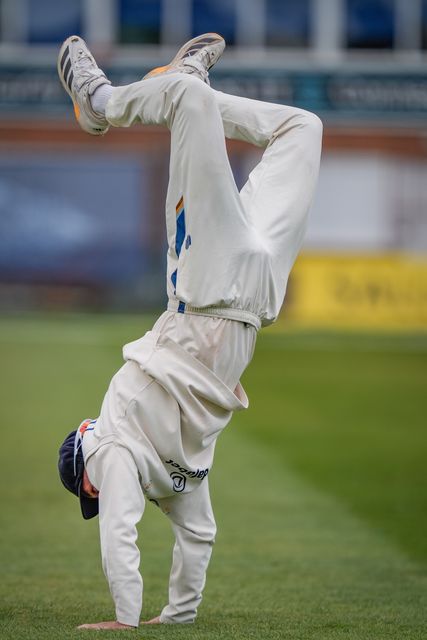 Zak Chappell does a hand stand during the County Championship Division Two Derbyshire vs Northamptonshire day four match at The Central Co-Op County Ground, Derby, United Kingdom on 11 May 2026

(Photo by Maynard Manyowa/News Images)