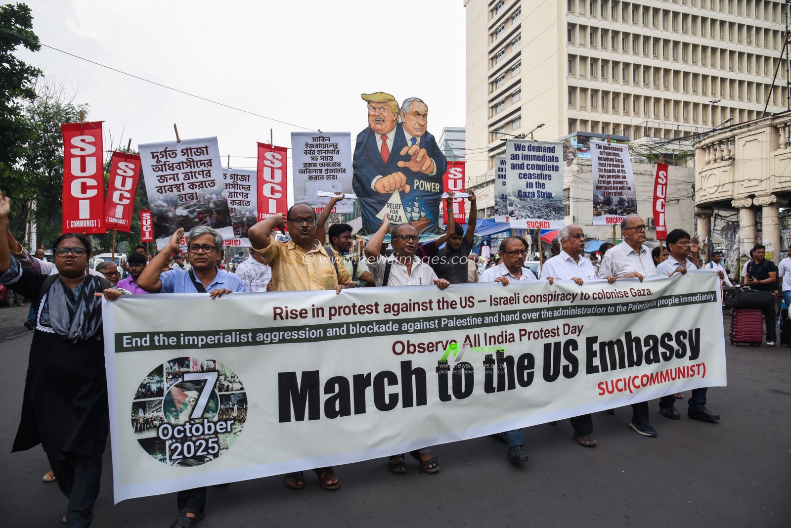 Activists of Social Unity Center of India (SUCI) hold placards and an effigy of US President Donald Trump and Israel's Prime Minister Benjamin Netanyahu during a protest against Western policy in the Israel-Hamas conflict, near US Embassy in Kolkata, Eastern India, 07 October 2025.Photo by Debajyoti Chakraborty.(Photo: Debajyoti Chakraborty/News Images)