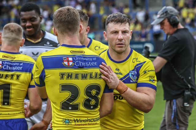 Jake Thewlis of Warrington Wolves shakes hands with George Williams of Warrington Wolves after the game during the Betfred Super League round 16 match Warrington Wolves vs Hull FC at Halliwell Jones Stadium, Warrington, United Kingdom, 28th June 2025

(Photo by Alfie Cosgrove/News Images)