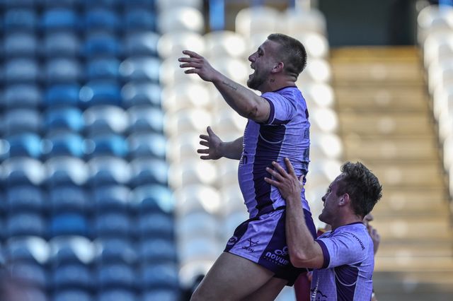 Mikey Lewis of Hull KR celebrates his try during the Betfred Super League Round 6 match Huddersfield Giants vs Hull KR at John Smith's Stadium, Huddersfield, United Kingdom, 30th March 2025

(Photo by Alfie Cosgrove/News Images)