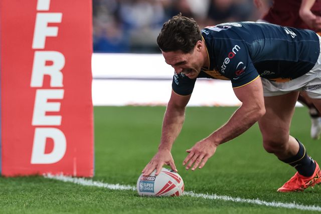 Brodie Croft of Leeds Rhinos goes over for a try during the Betfred Super League round 12 match Leeds Rhinos vs Huddersfield Giants at AMT Headingley Stadium, Leeds, United Kingdom on 22 May 2026

(Photo by Mark Cosgrove/News Images)