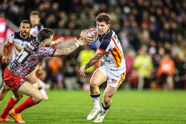Toby Sexton of Catalans Dragons breaks with the ball under pressure from Gareth O'Brien of Leigh Leopards during the Betfred Super League match Leigh Leopards vs Catalans Dragons at Leigh Sports Village, Leigh, United Kingdom on 06 March 2026

(Photo by Alfie Cosgrove/News Images)