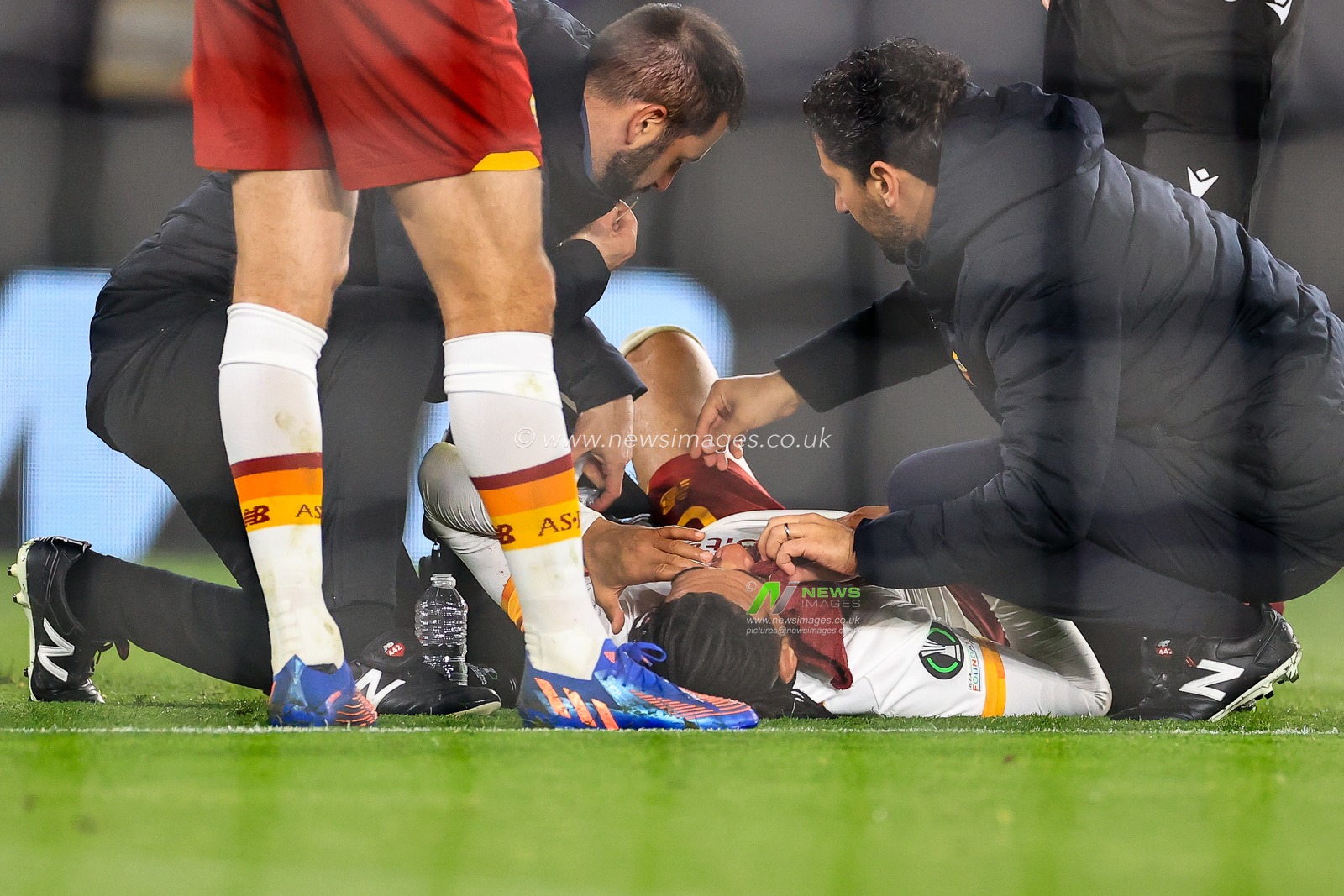 Chris Smalling #6 of Roma receives treatment for an injury
