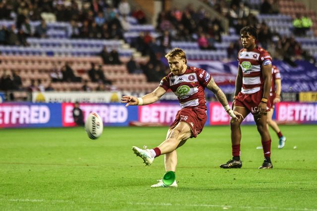 Adam Keighran of Wigan Warriors scores a penalty during the Betfred Super League Semi Final 1 match Wigan Warriors vs Leigh Leopards at The Brick Community Stadium, Wigan, United Kingdom, 3rd October 2025

(Photo by Alfie Cosgrove/News Images)