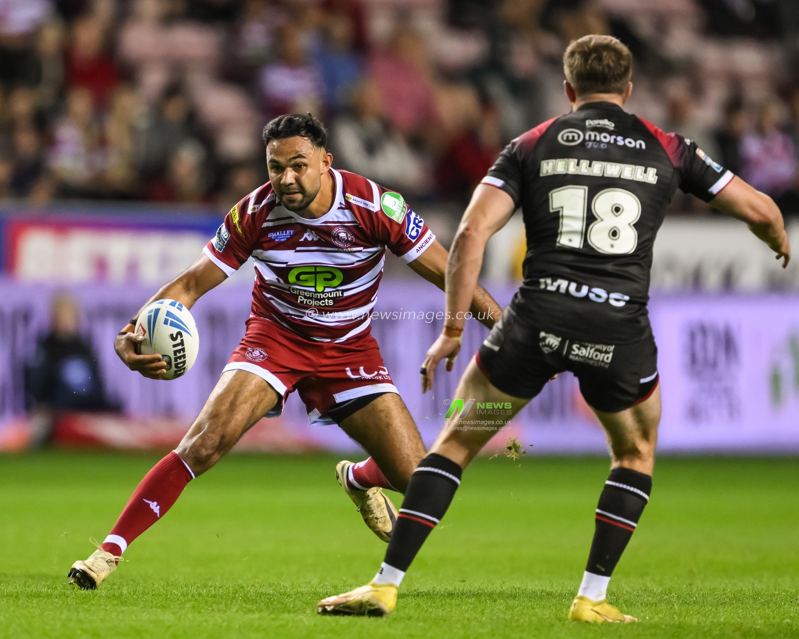 Bevan French of Wigan Warriors makes a break during the Betfred Super League Round 27 match Wigan Warriors vs Salford Red Devils at The Brick Community Stadium, Wigan, United Kingdom, 19th September 2024

(Photo by Craig Thomas/News Images)