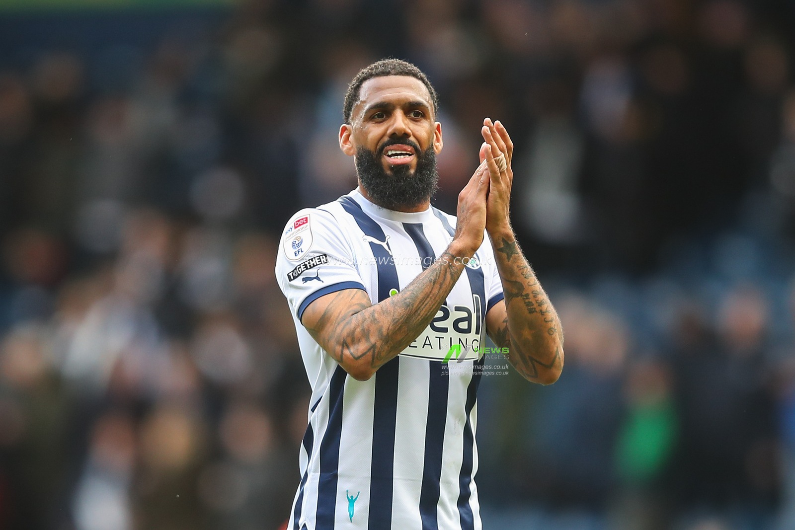 Yann M'Vila of West Bromwich Albion applauds the home fans after the Sky Bet Championship match West Bromwich Albion vs Watford at The Hawthorns, West Bromwich, United Kingdom, 1st April 2024

(Photo by Gareth Evans/News Images)