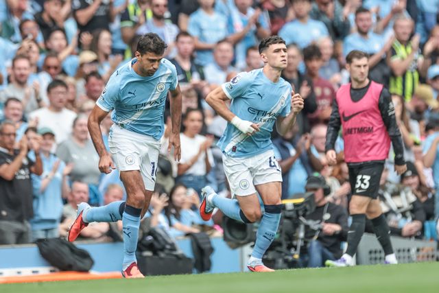 Rodri and Phil Foden of Manchester City are subbed on  during the Premier League match Manchester City vs Tottenham Hotspur at Etihad Stadium, Manchester, United Kingdom, 23rd August 2025

(Photo by Mark Cosgrove/News Images)