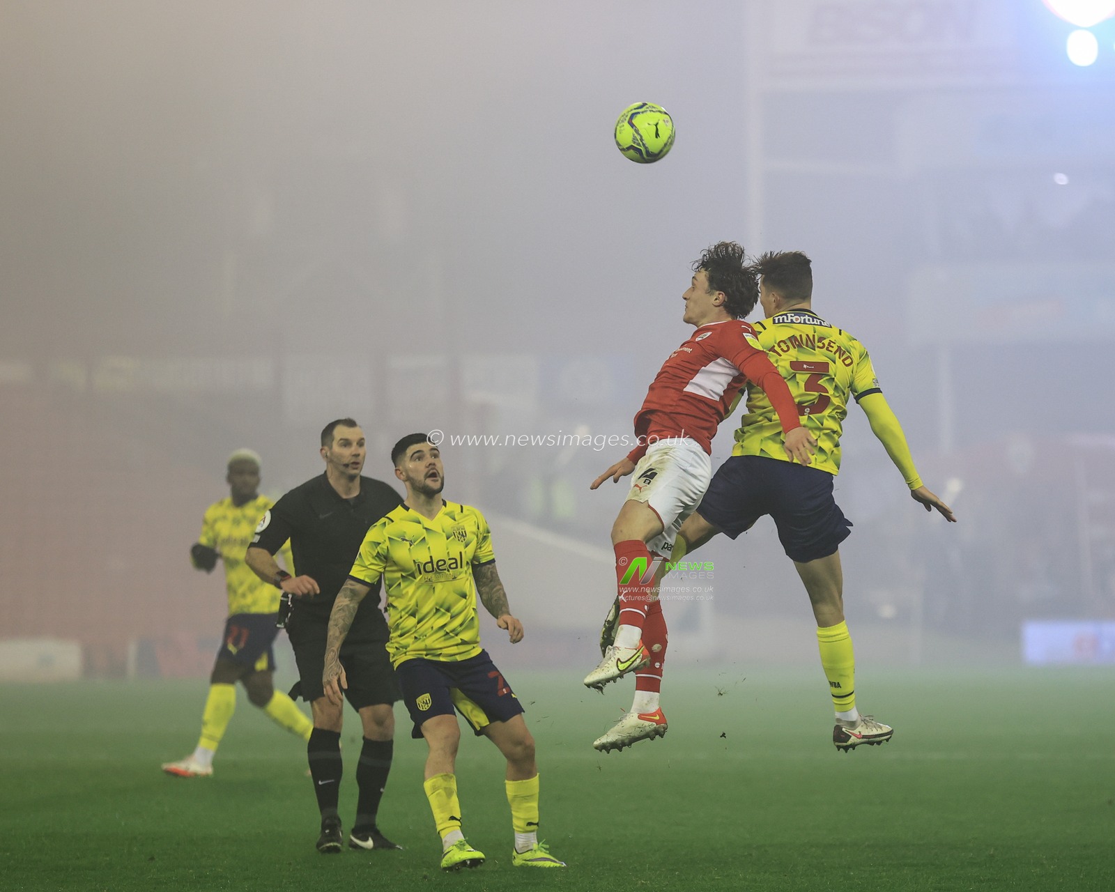Callum Styles #4 of Barnsley and Conor Townsend #3 of West Bromwich Albion battle for the ball