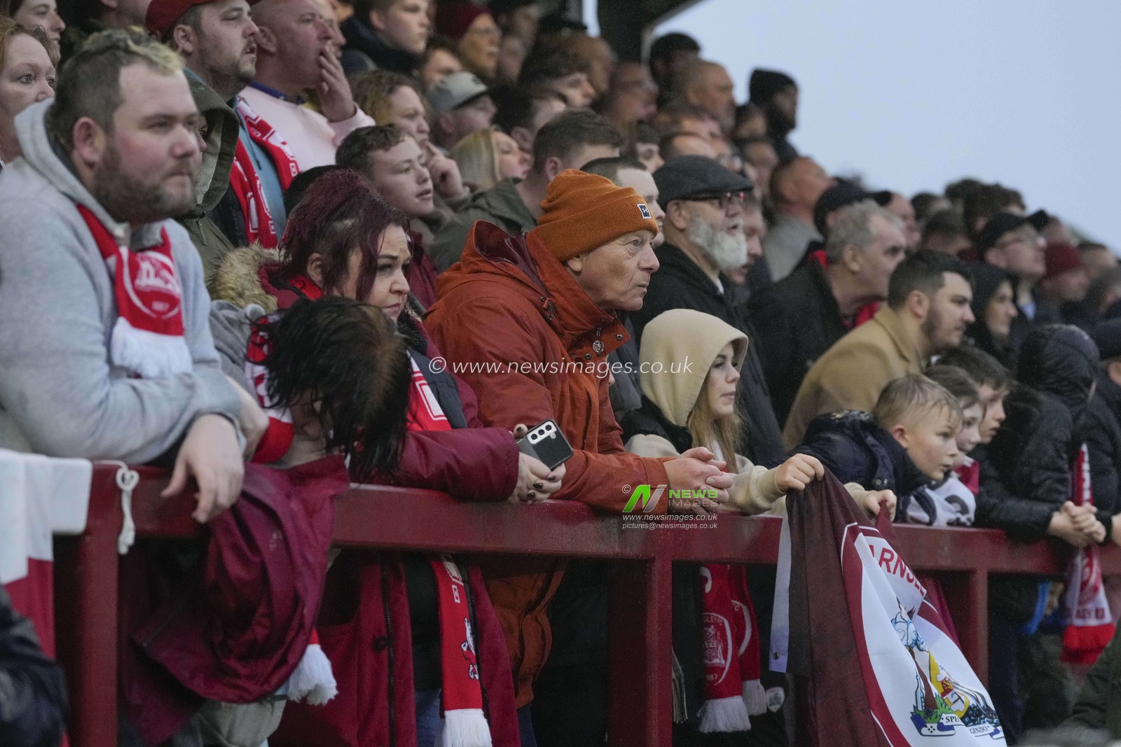 Barnsley fans supporting their side in the horrendous weather during the Sky Bet League 1 match Fleetwood Town vs Barnsley at Highbury Stadium, Fleetwood, United Kingdom, 17th February 2024

(Photo by Steve Flynn/News Images)