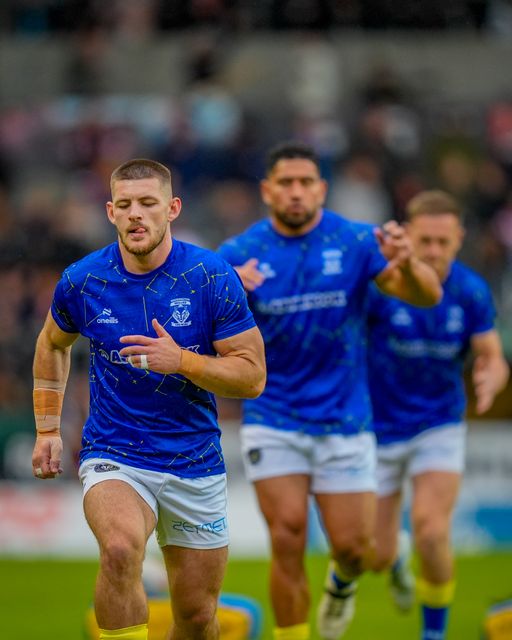 Warrington warriors players in the pre-game warm up session during the Betfred Super League round 14 match St Helens vs Warrington Wolves at The BrewDog Stadium, St Helens, United Kingdom on 11 June 2026

(Photo by Maynard Manyowa/News Images)