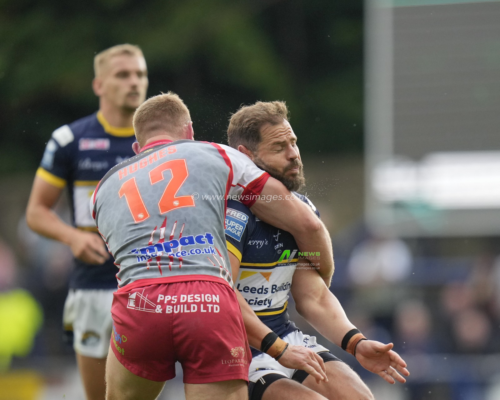Aidan Sezer #7 of Leeds Rhinos gets a late hit from Jack Hughes #12 of Leigh Leopards after he passes the ball during the Betfred Super League Round 21 match Leeds Rhinos vs Leigh Leopards at Headingley Stadium, Leeds, United Kingdom, 6th August 2023

(Photo by Steve Flynn/News Images)