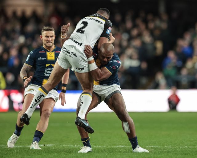Ben Jones-Bishop of York Knights is tackled by Maika Sivo of Leeds Rhinos during the Betfred Super League Round 2 match Leeds Rhinos vs York Knights at AMT Headingley Stadium, Leeds, United Kingdom on 20 February 2026

(Photo by Mark Cosgrove/News Images)
