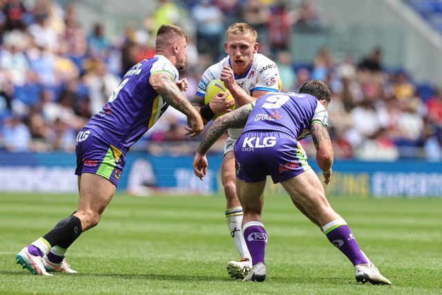 Mikolaj Oledzki of Leeds Rhinos is tackled by Ryan Sutton of Bradford Bulls and Andy Ackers of Bradford Bulls during the Betfred Super League Magic Weekend match Leeds Rhinos vs Bradford Bulls at Hill Dickinson Stadium, Liverpool, United Kingdom on 05 July 2026

(Photo by Mark Cosgrove/News Images)