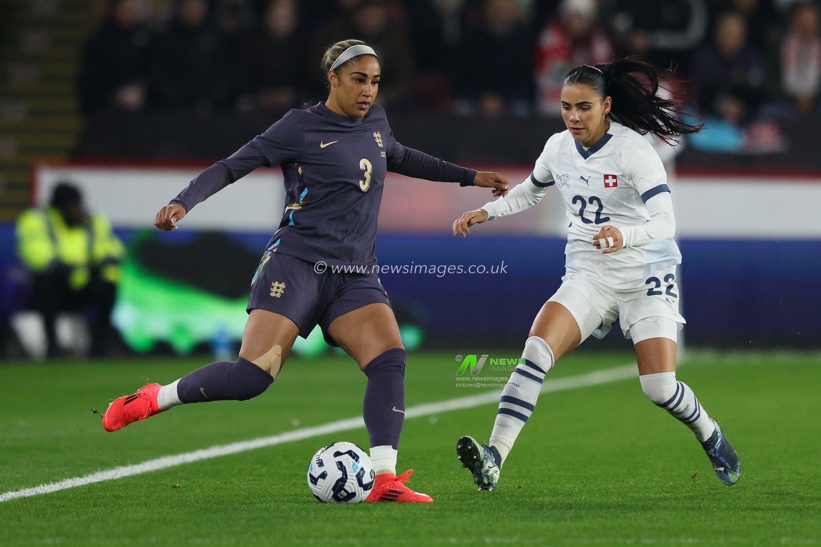 Gabby George of England passes the ball across during the Women's International Friendly match England Women vs Switzerland women at Bramall Lane, Sheffield, United Kingdom, 3rd December 2024

(Photo by Alex Roebuck/News Images)