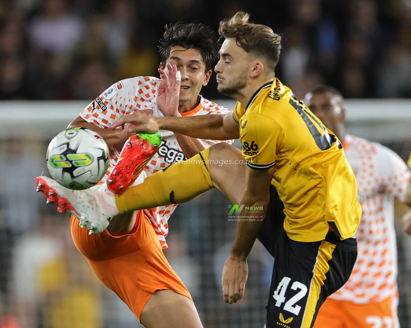 Kenny Dougall #12 of Blackpool goes in for a tackle during the Carabao Cup match Wolverhampton Wanderers vs Blackpool at Molineux, Wolverhampton, United Kingdom, 29th August 2023

(Photo by Mark Cosgrove/News Images)