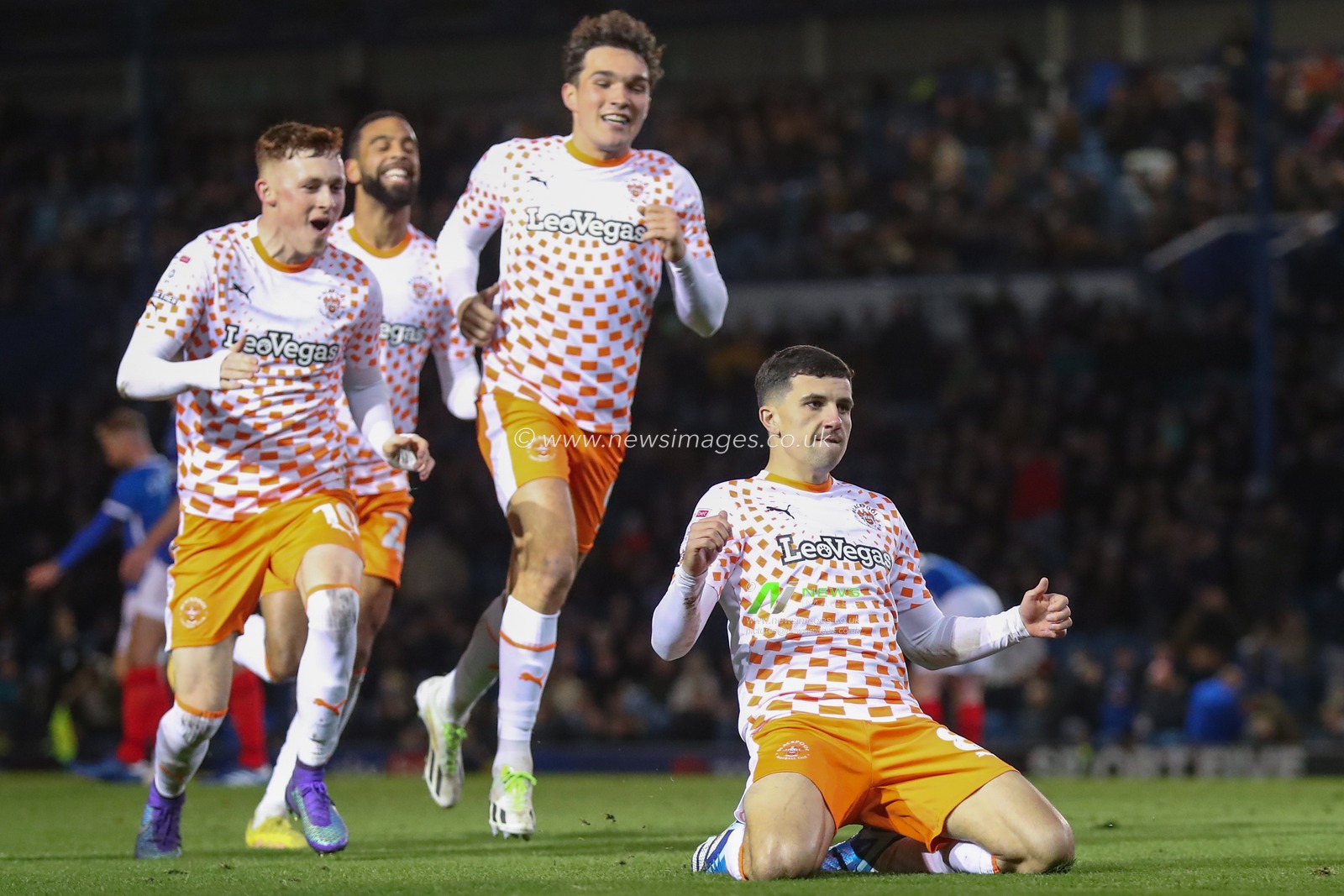 Albie Morgan #8 of Blackpool celebrates his goal to make it 0-4 during the Sky Bet League 1 match Portsmouth vs Blackpool at Fratton Park, Portsmouth, United Kingdom, 25th November 2023

(Photo by Gareth Evans/News Images)