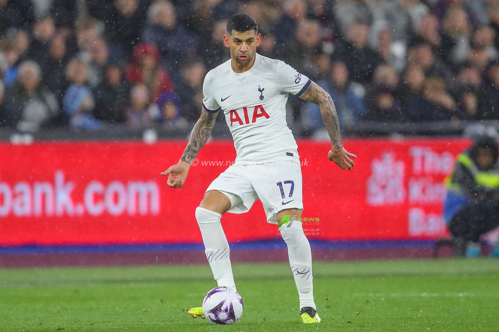Cristian Romero of Tottenham Hotspur passes the ball during the Premier League match West Ham United vs Tottenham Hotspur at London Stadium, London, United Kingdom, 2nd April 2024

(Photo by Gareth Evans/News Images)