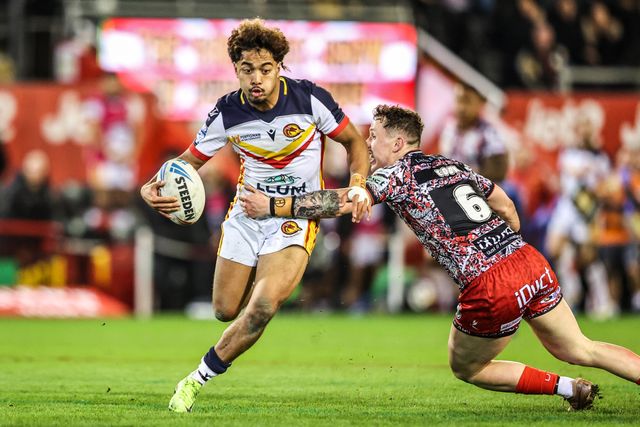 Phoenix Laulu-Togaga'e of Catalans Dragons evades a tackle from Adam Cook of Leigh Leopards during the Betfred Super League match Leigh Leopards vs Catalans Dragons at Leigh Sports Village, Leigh, United Kingdom on 06 March 2026

(Photo by Alfie Cosgrove/News Images)