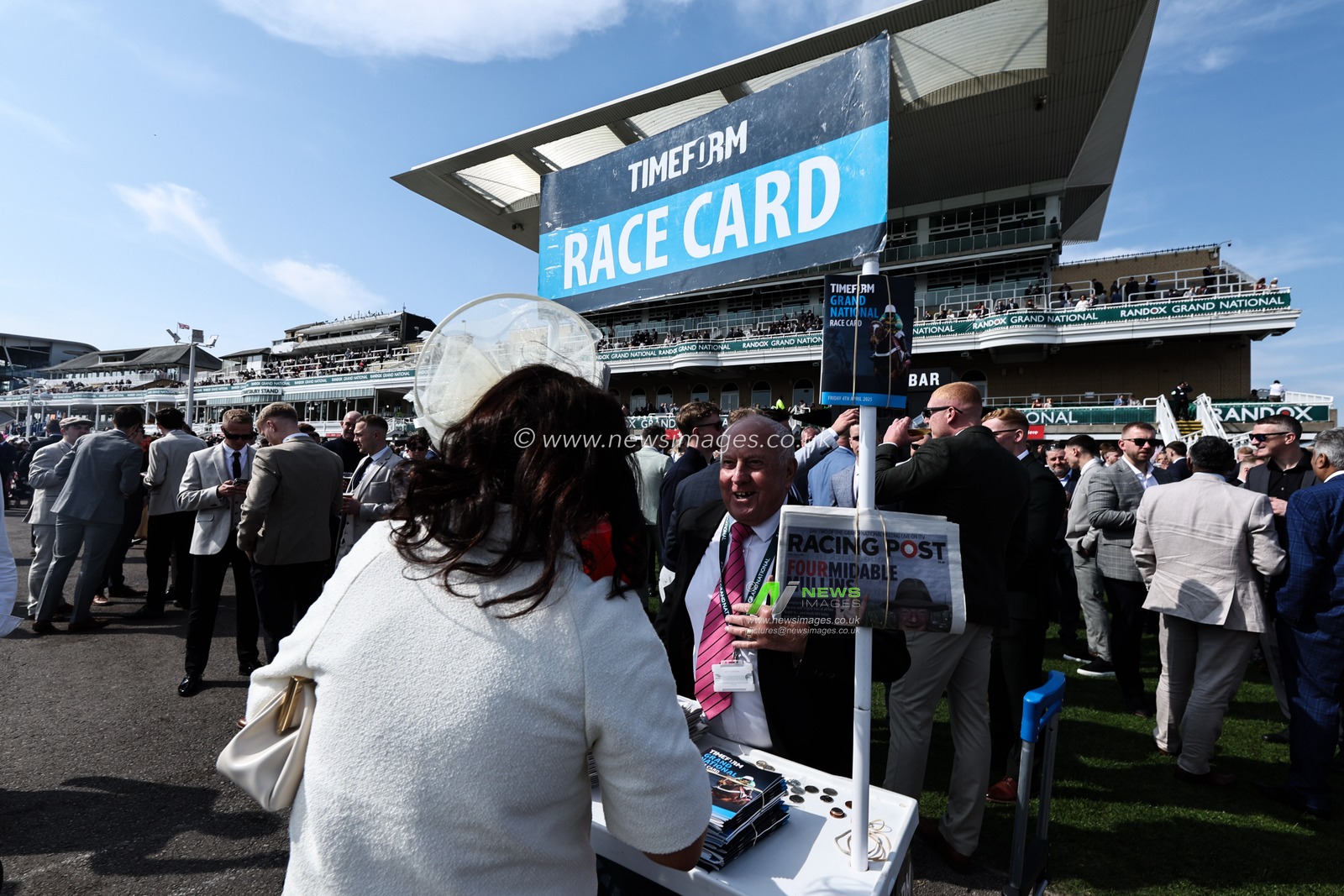 Racegoers purchase race cards during the Randox Grand National 2025 Day 2 Ladies Day at Aintree Racecourse, Liverpool, United Kingdom, 4th April 2025

(Photo by Mark Cosgrove/News Images)