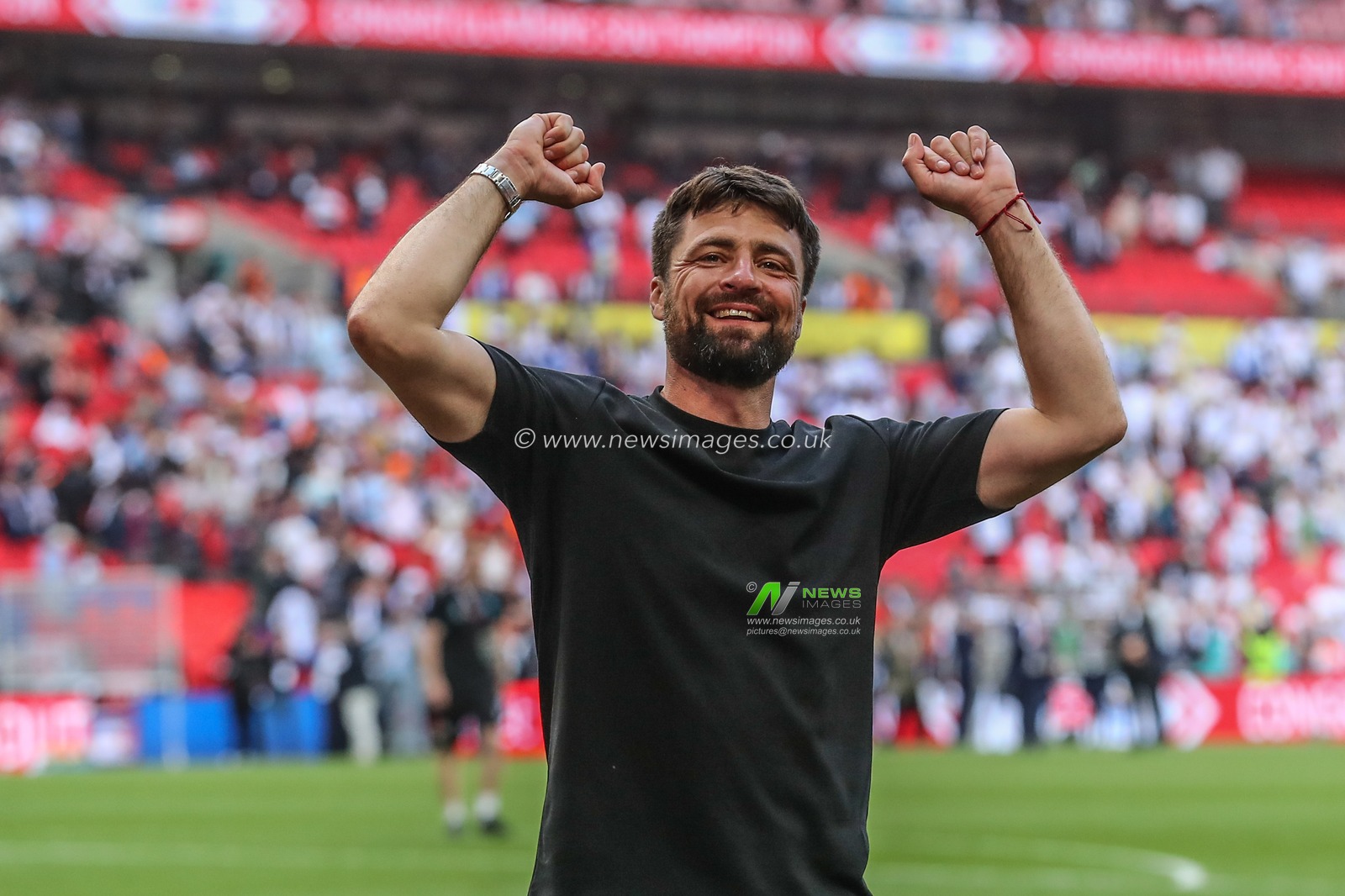 Russell Martin manager of Southampton celebrates his teams promotion to the Premier League during the Sky Bet Championship Play-Off Final match Leeds United vs Southampton at Wembley Stadium, London, United Kingdom, 26th May 2024

(Photo by Gareth Evans/News Images)