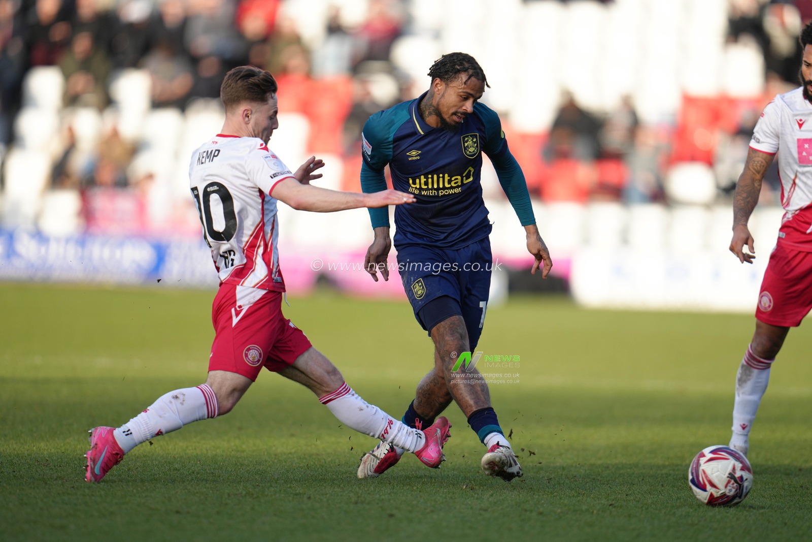 Josh Koroma of Huddersfield Town plays ball under pressure during the Sky Bet League 1 match Stevenage vs Huddersfield Town at Lamex Stadium, Stevenage, United Kingdom, 1st March 2025

(Photo by Harvey Murphy/News Images)