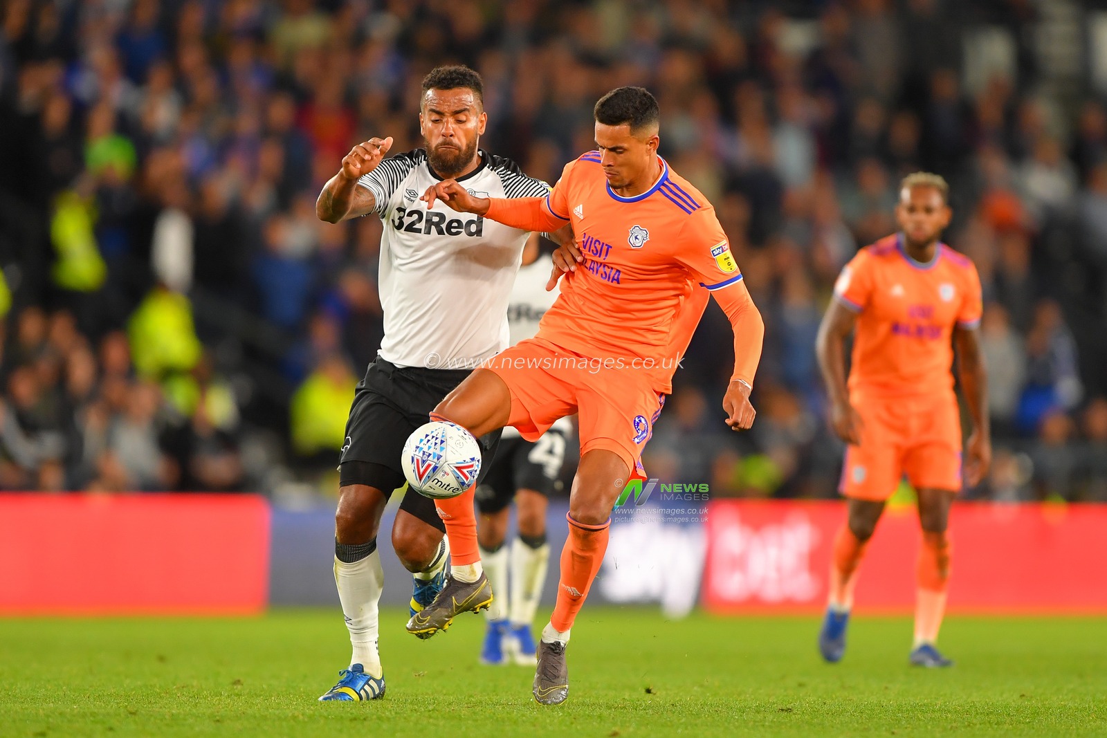 13th September 2019, Pride Park, Derby, England; Sky Bet Championship Football, Derby County vs Cardiff City ; Robert Glatzel (9) of Cardiff City battles with Tom Huddlestone (44) of Derby County 

Credit: Jon Hobley/News Images 

English Football League images are subject to DataCo Licence
