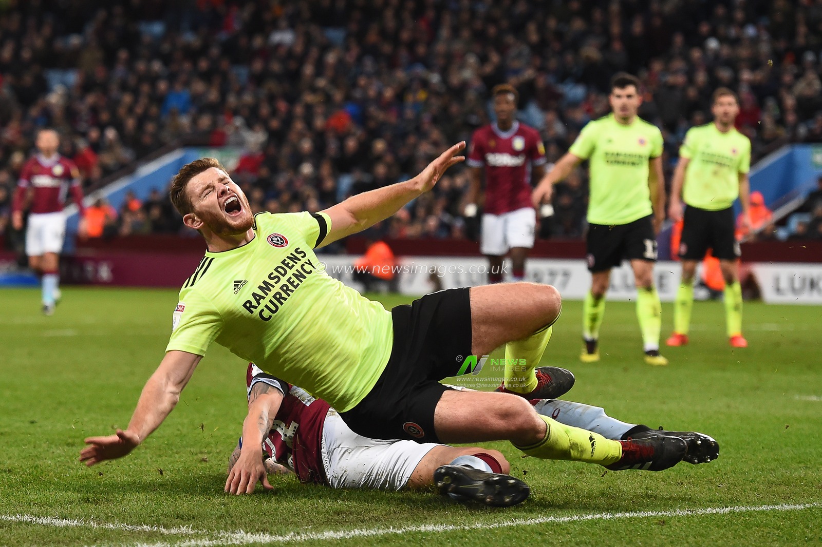 8th February 2019, Villa Park, Birmingham, England ; Sky Bet Championship, Aston Villa v Sheffield United : Jack O'Connell (5) of Sheffield United after a tackle by Alan Hutton (21) of Aston Villa 

Credit: Jon Hobley/News Images

English Football League images are subject to DataCo Licence