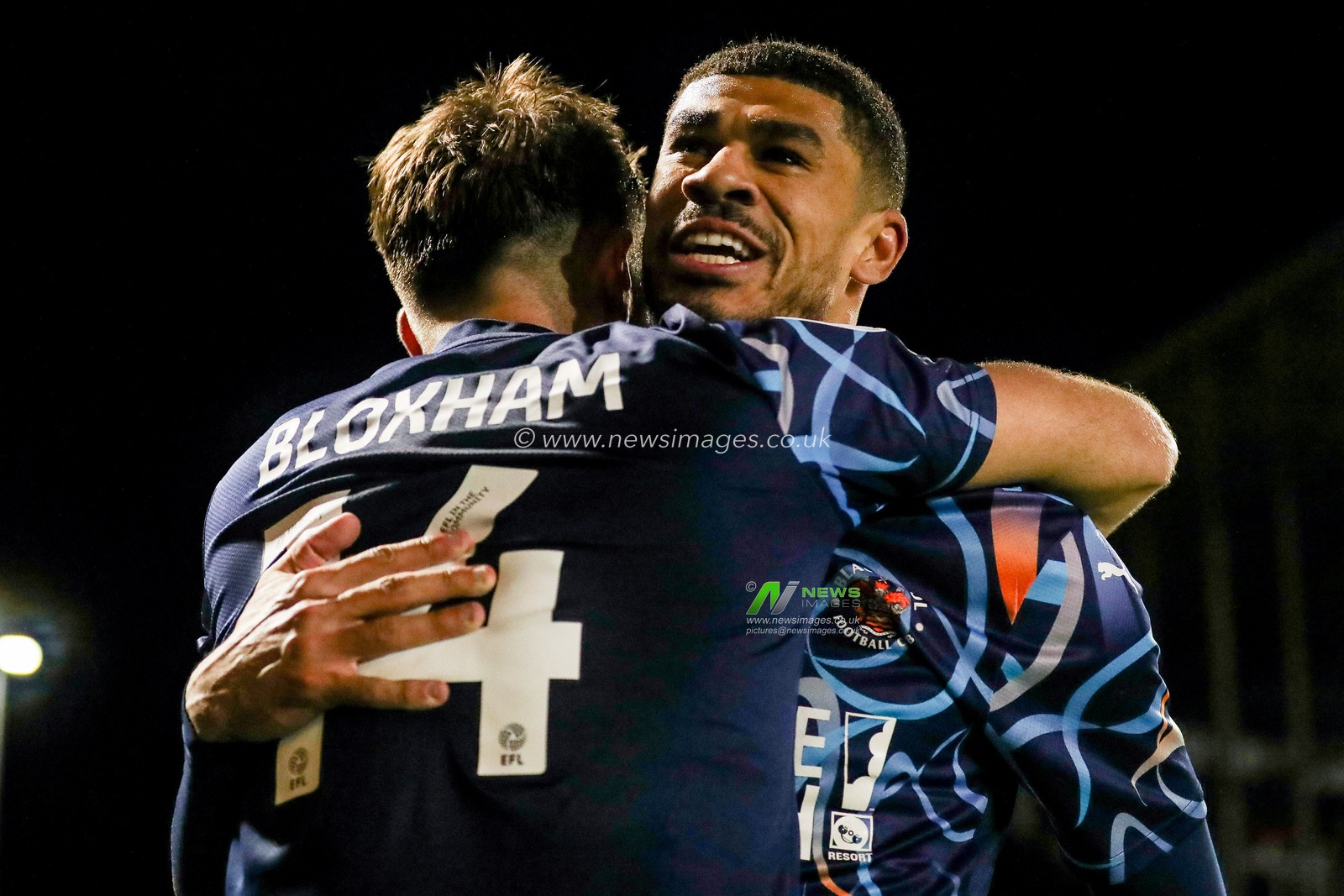 Ashley Fletcher of Blackpool celebrates his goal with Tom Bloxhan to make it 0-1 during the Sky Bet League 1 match Lincoln City vs Blackpool at Gelder Group Sincil Bank Stadium, Lincoln, United Kingdom, 28th January 2025

(Photo by Izzy Poles/News Images)