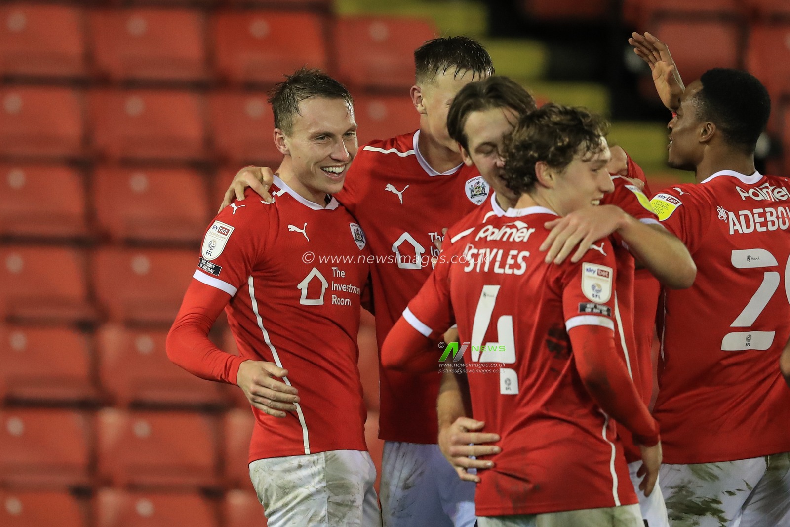 Cauley Woodrow #9 of Barnsley celebrates his goal to make it 2-0