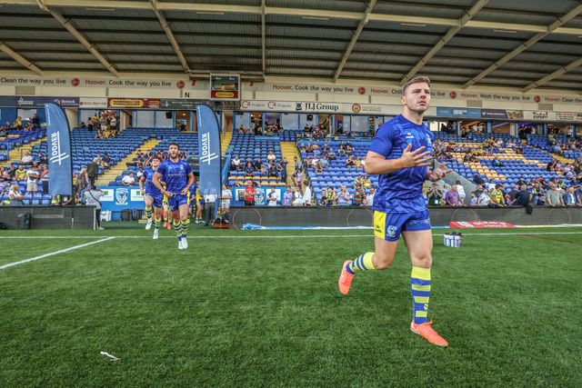 George Williams of Warrington Wolves comes out for the warmups during the Betfred Super League Round 22 match Warrington Wolves vs Catalans Dragons at Halliwell Jones Stadium, Warrington, United Kingdom, 14th August 2025

(Photo by Alfie Cosgrove/News Images)
