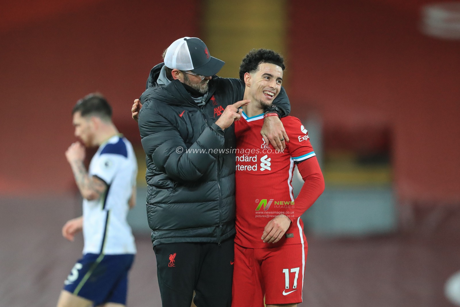 JÃ¼rgen Klopp manager of Liverpool and Curtis Jones #17 of Liverpool celebrate Liverpools 2-1 win