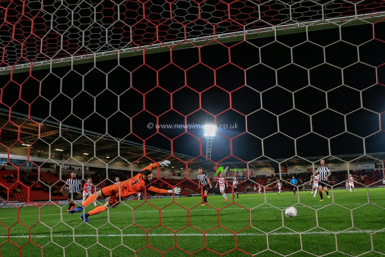 20th November 2018, Keepmoat Stadium, Doncaster, England; The Emirates FA Cup, Round 1, Doncaster Rovers v Chorley ; Alfie May (19) of Doncaster scores to make it  1-0

Credit: Mark Cosgrove/News Images

English Football League images are subject to DataCo Licence
