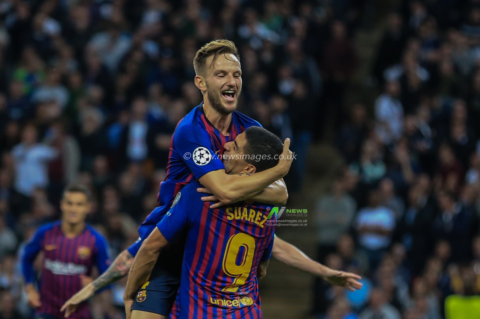 3rd October 2018, Wembley Stadium, London, England; UEFA Champions League, Tottenham v Barcelona ; Ivan Rakitic (04) of Barcelona celebrates his goal to make it 0-2 with Luis Suarez (09) of Barcelona 


Credit: Mark Cosgrove/News Images