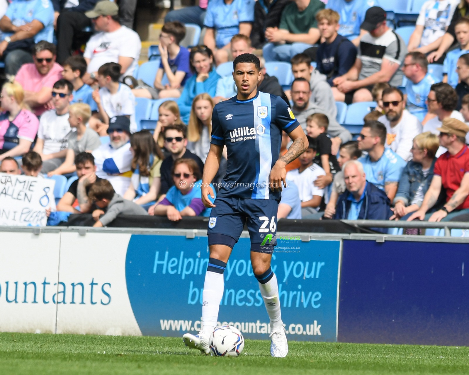 Levi Colwill #26 of Huddersfield Town in action during the game