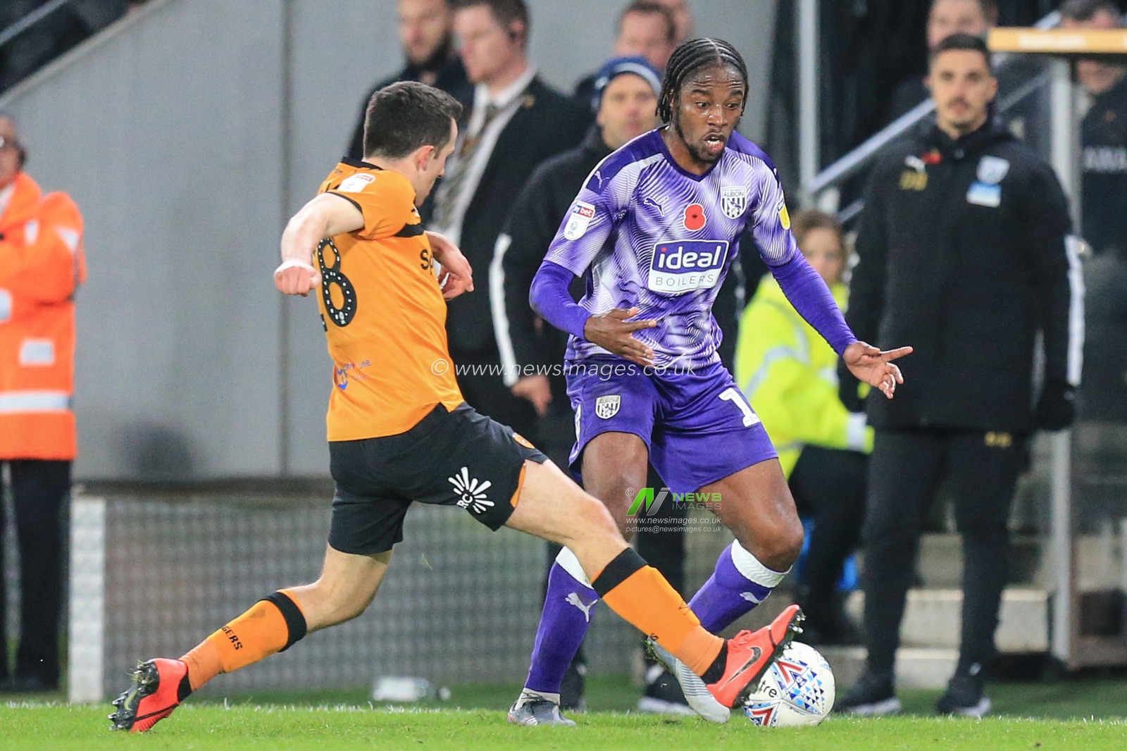 9th November 2019, KC Stadium, Kingston upon Hull, England; Sky Bet Championship, Hull City v West Bromwich Albion : Romain Sawyers (19) of West Bromwich Albion attempts to get past George Honeyman (18) of Hull City 

Credit: David Greaves/News Images