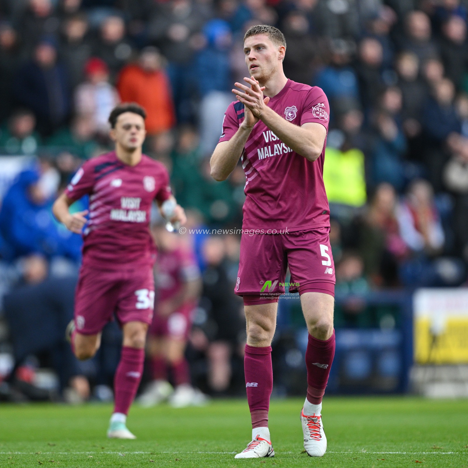 Mark McGuinness 5# of Cardiff City Association Football Club claps fans ahead of the kick off, during the Sky Bet Championship match Preston North End vs Cardiff City at Deepdale, Preston, United Kingdom, 25th November 2023

(Photo by Cody Froggatt/News Images)