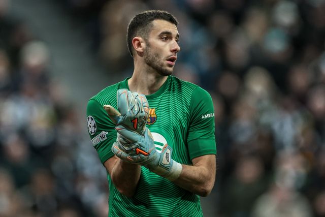 Barcelona goalkeeper Joan Garcia adjusts his gloves during the UEFA Champions League Last 16 match Newcastle Untied vs Barcelona at St. James's Park, Newcastle, United Kingdom on 10 March 2026

(Photo by Mark Cosgrove/News Images)