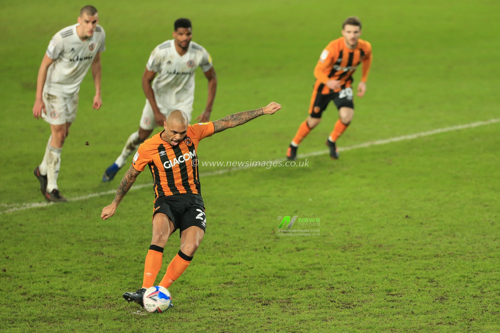 Josh Magennis #27 of Hull City scores a penalty to make it 3-0