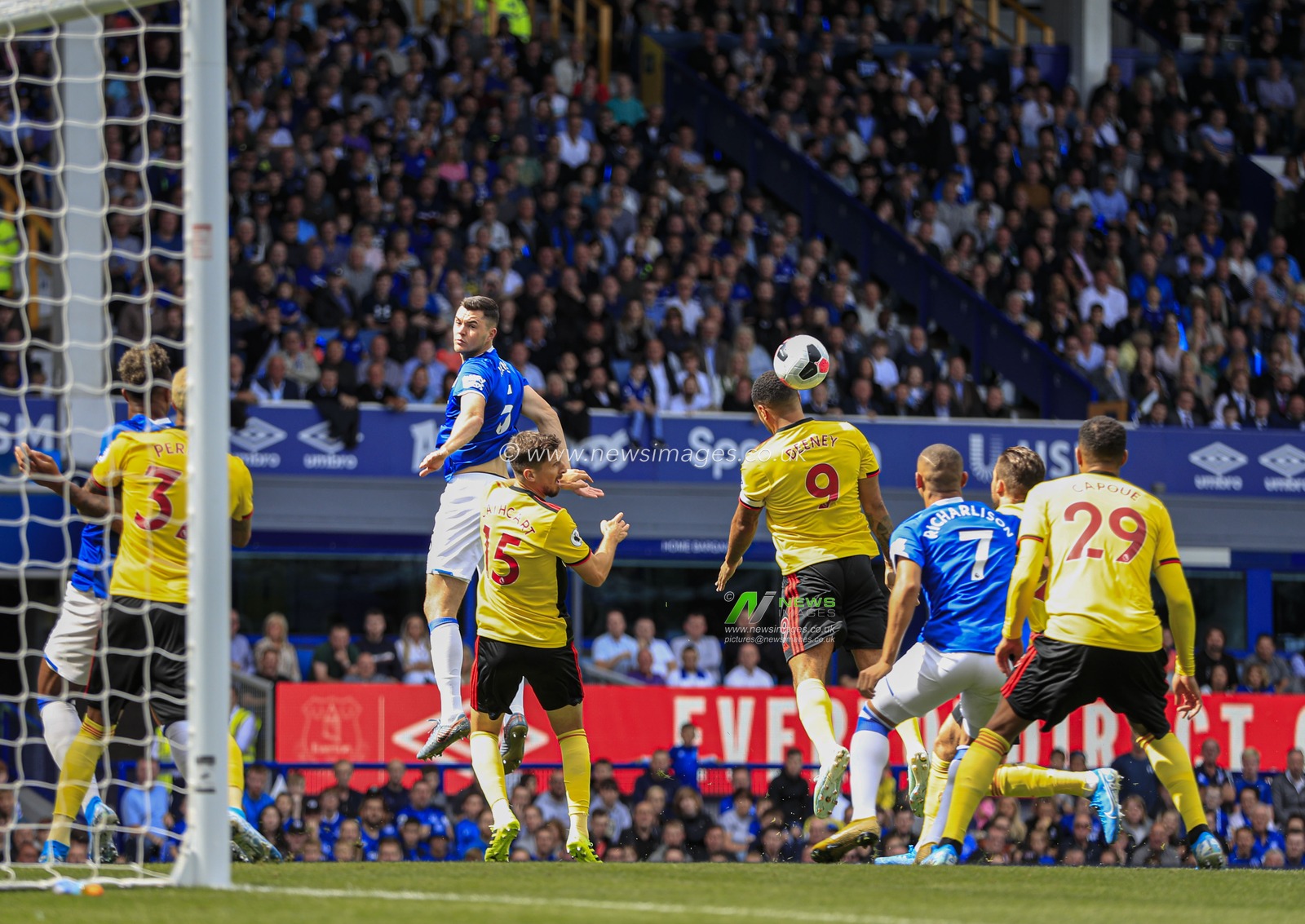 17th August 2019, Goodison Park, Liverpool, England ; Premier League Football, Everton vs Watford : Troy Deeney (09) of Watford makes a defensive header

Credit: Conor Molloy/News Images

English Football League images are subject to DataCo Licence