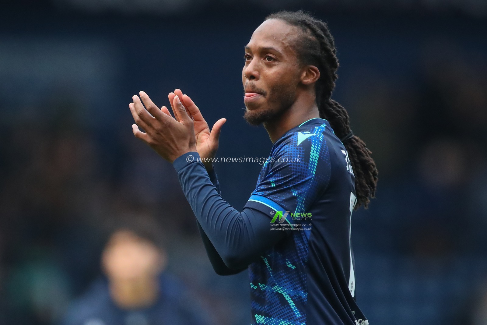 Daniel Johnson #12 of Stoke City applauds the travelling fans after the Sky Bet Championship match West Bromwich Albion vs Stoke City at The Hawthorns, West Bromwich, United Kingdom, 17th December 2023

(Photo by Gareth Evans/News Images)