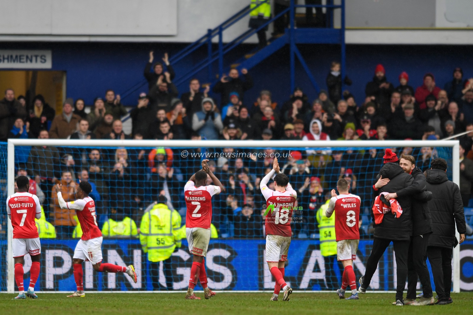 The Rotherham United players celebrate beating Sheffield Wednesday 0-2 in front of the travelling supporters