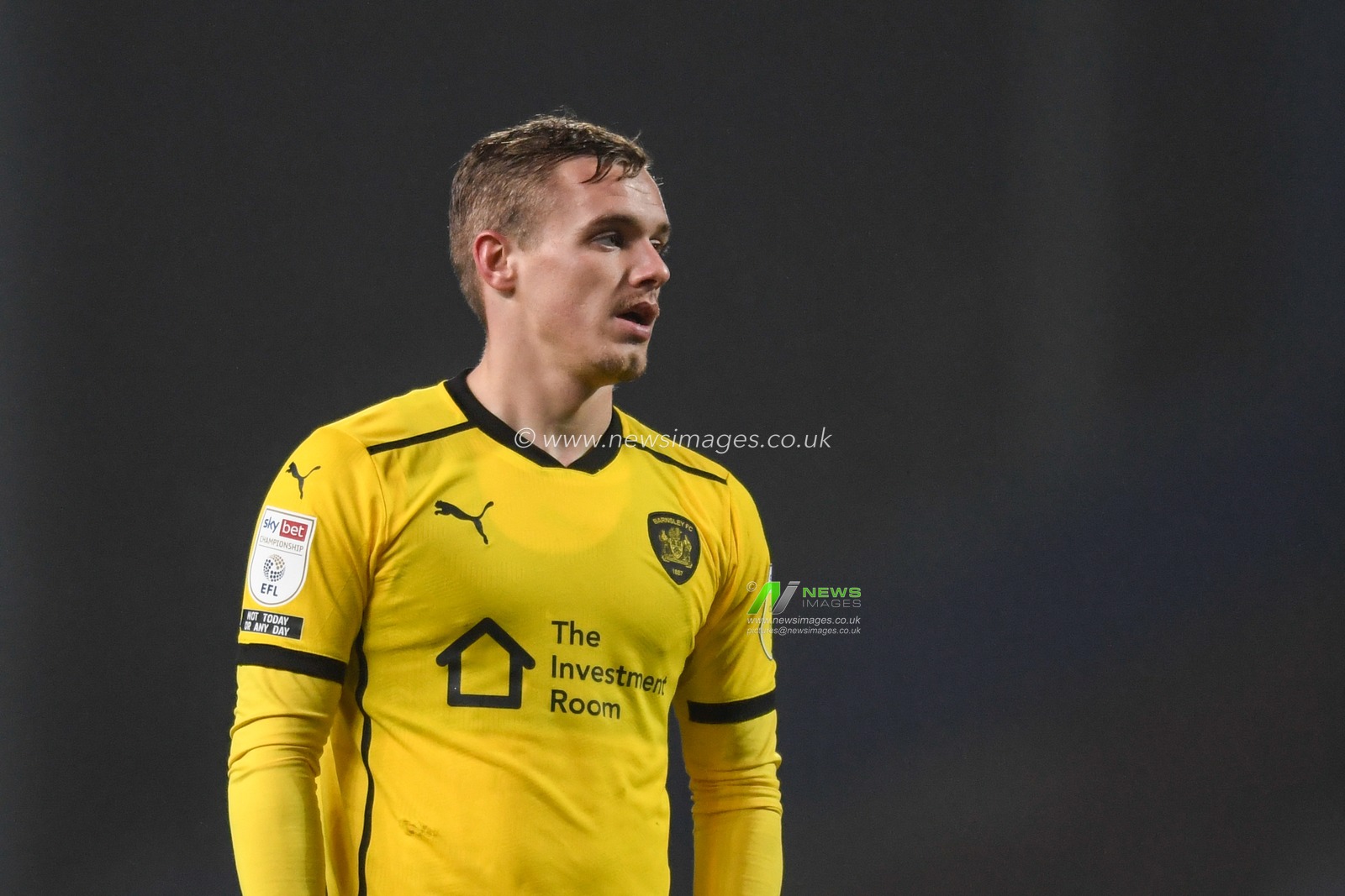 Luke Thomas #16 of Barnsley in action during the game