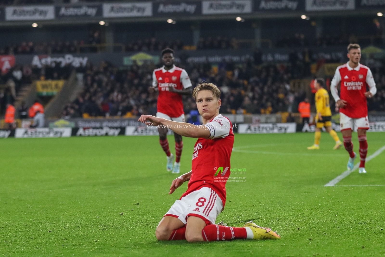 Martin Ã˜degaard #8 of Arsenal celebrates his goal to make it 0-2 during the Premier League match Wolverhampton Wanderers vs Arsenal at Molineux, Wolverhampton, United Kingdom, 12th November 2022

(Photo by Gareth Evans/News Images)