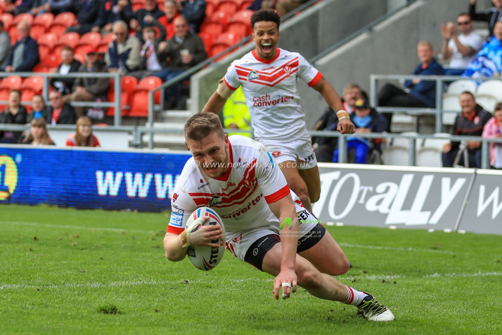 28th April 2019 , Totally Wicked Stadium, St Helens, England;  Betfred Super League, Round 13, St Helens vs Catalans Dragons ; Matthew Costello (24) of St Helens goes over for a hat-trick of tries 

Credit: Mark Cosgrove/News Images