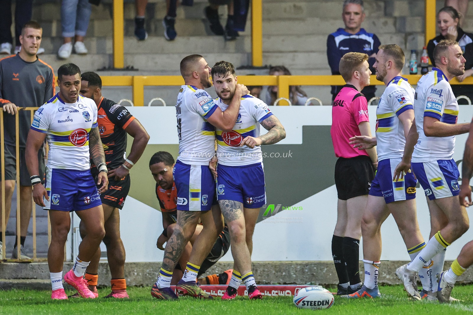Connor Wrench #20 of Warrington Wolves celebrates their try during the Betfred Super League Round 16 match Castleford Tigers vs Warrington Wolves at The Mend-A-Hose Jungle, Castleford, United Kingdom, 23rd June 2023

(Photo by Mark Cosgrove/News Images)