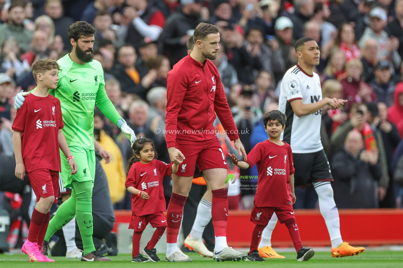 Jordan Henderson #14 of Liverpool leads his team out ahead of the Premier League match Liverpool vs Fulham at Anfield, Liverpool, United Kingdom, 3rd May 2023

(Photo by Mark Cosgrove/News Images)