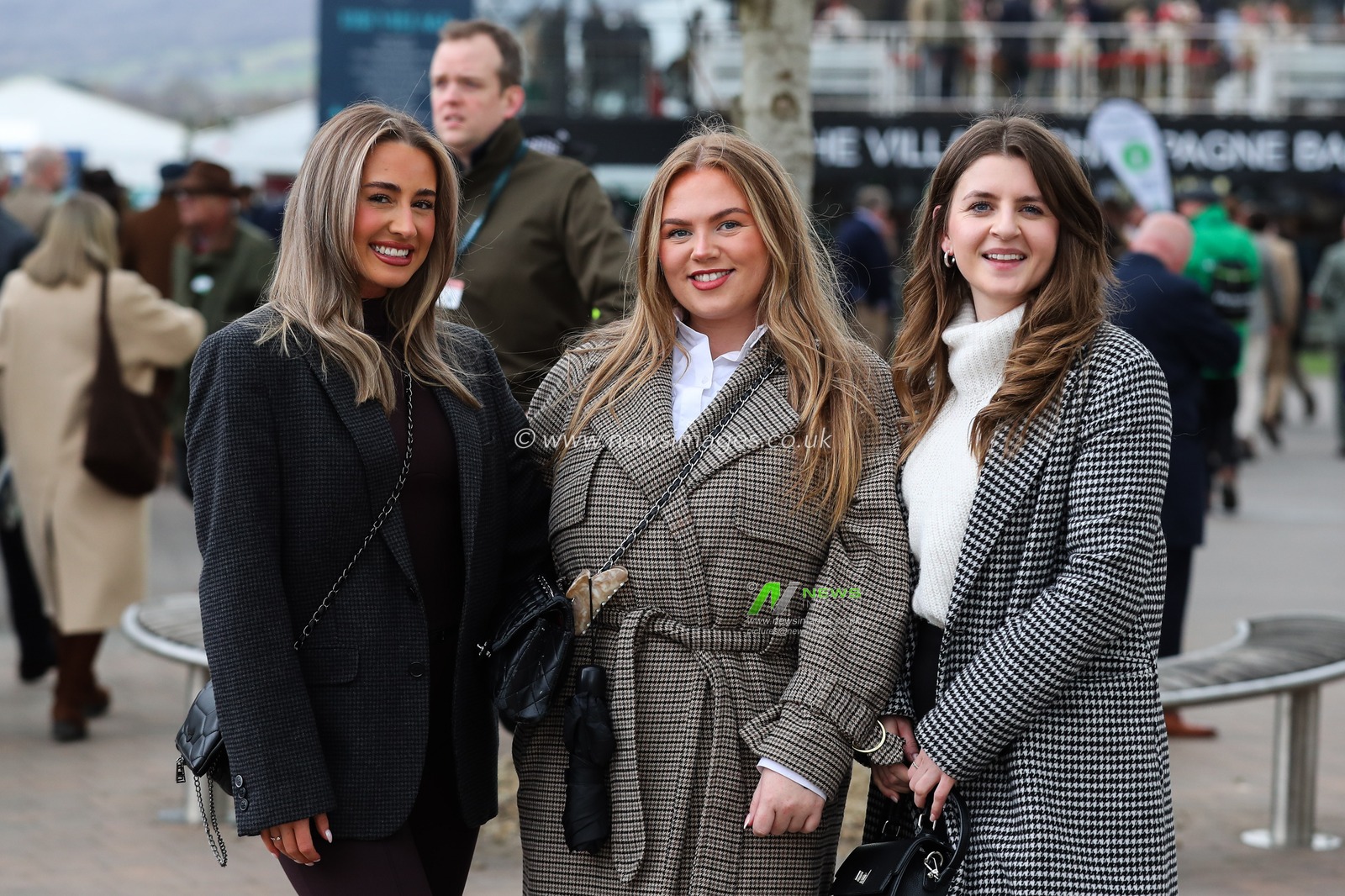 Racegoers pose for a photo ahead of the Cheltenham Festival 2025 St Patrickâ€™s Thursday at Cheltenham Racecourse, Cheltenham, United Kingdom, 13th March 2025

(Photo by Gareth Evans/News Images)