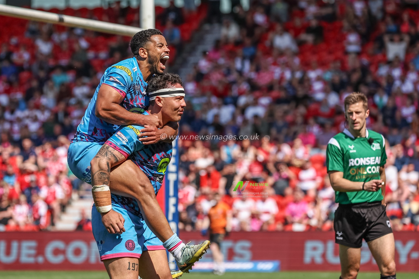Tyler Dupree of Wigan Warriors celebrates their try with Kruise Leeming of Wigan Warriors during the Betfred Challenge Cup Semi-Final Hull KR v Wigan Warriors at Eco-Power Stadium, Doncaster, United Kingdom, 18th May 2024

(Photo by Mark Cosgrove/News Images)