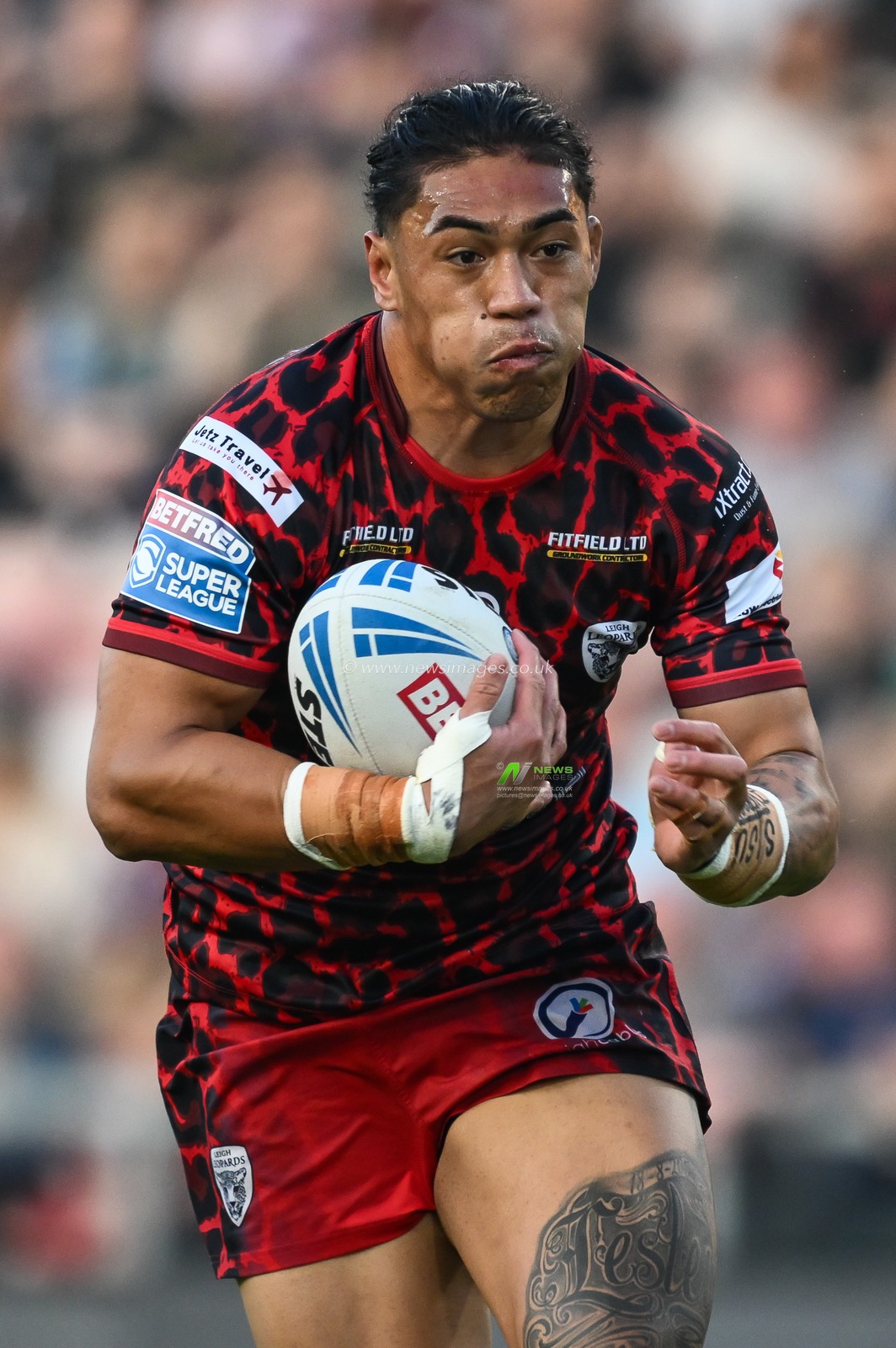 Tom Amone of Leigh Leopards makes a break during the Betfred Super League Round 11 match Leigh Leopards vs Salford Red Devils at Leigh Sports Village, Leigh, United Kingdom, 10th May 2024

(Photo by Craig Thomas/News Images)