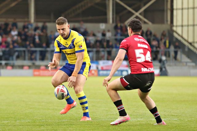 George Williams of Warrington Wolves kicks during the Betfred Super League round 17 match Salford Red Devils vs Warrington Wolves at Salford Community Stadium, Eccles, United Kingdom, 4th July 2025

(Photo by Sam Eaden/News Images)